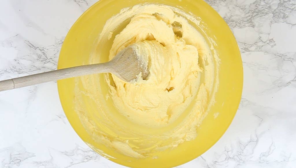 creaming the butter and sugar together in a bowl