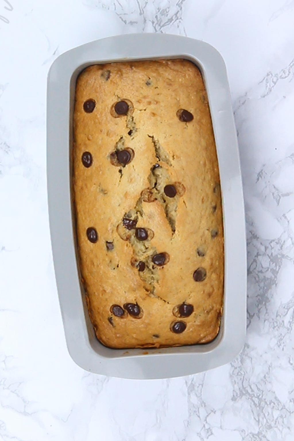baked chocolate chip banana bread in the loaf tin