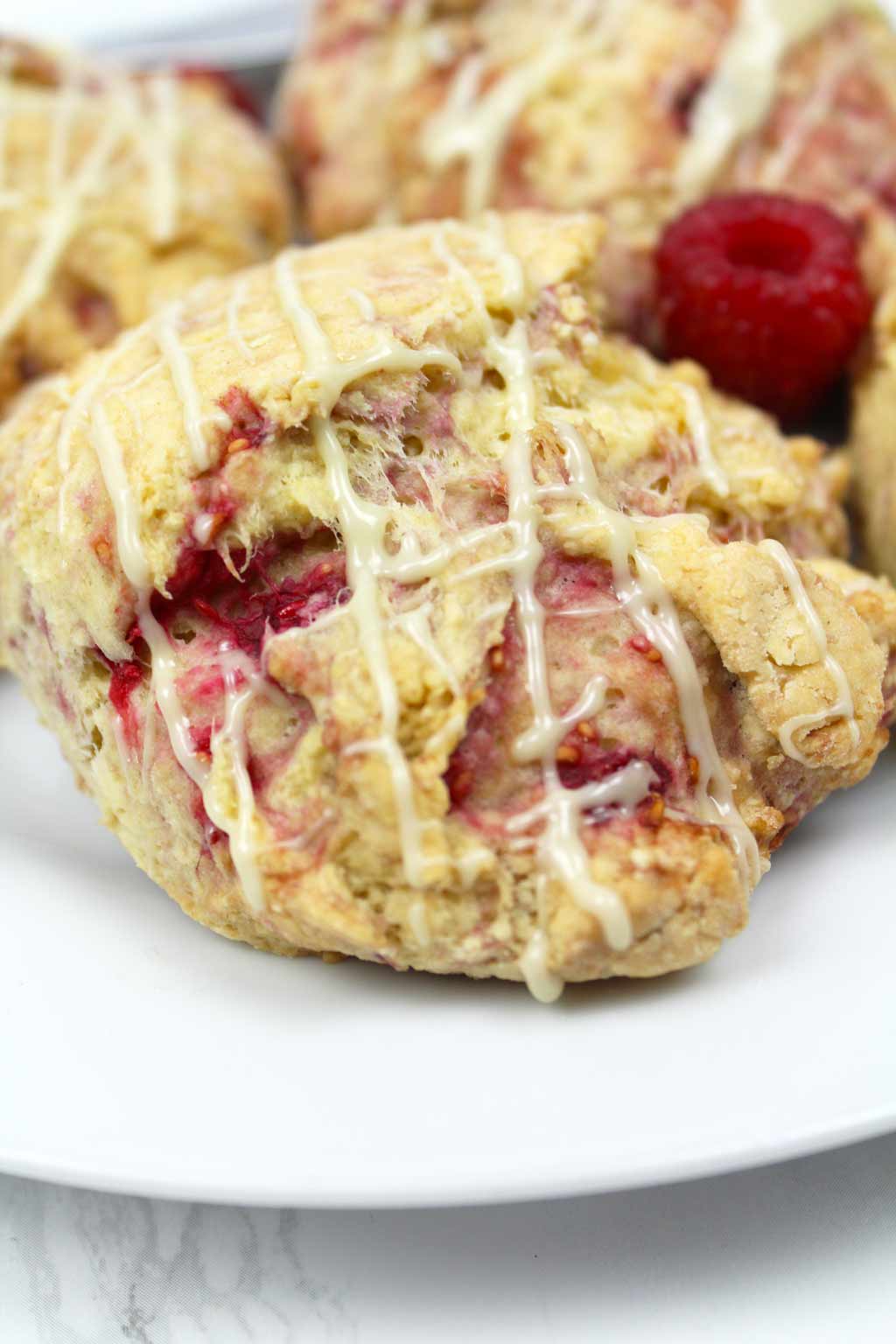 close up of raspberry white chocolate scone