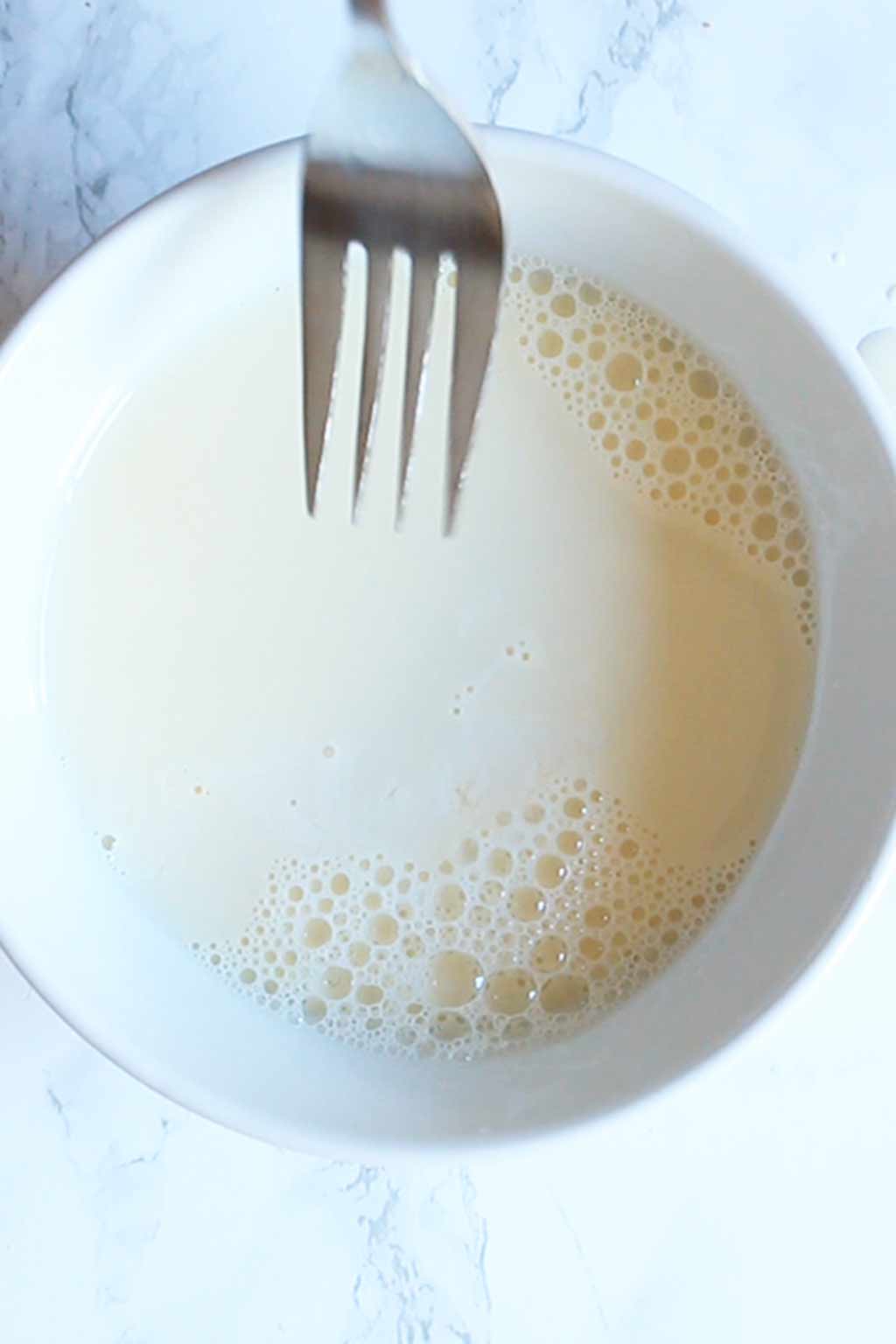 vegan buttermilk in a white ramekin