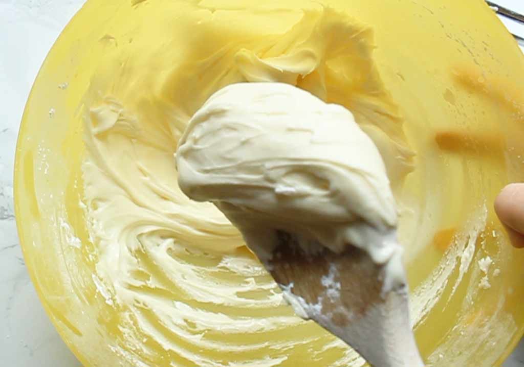 a large spoonful of vanilla frosting
