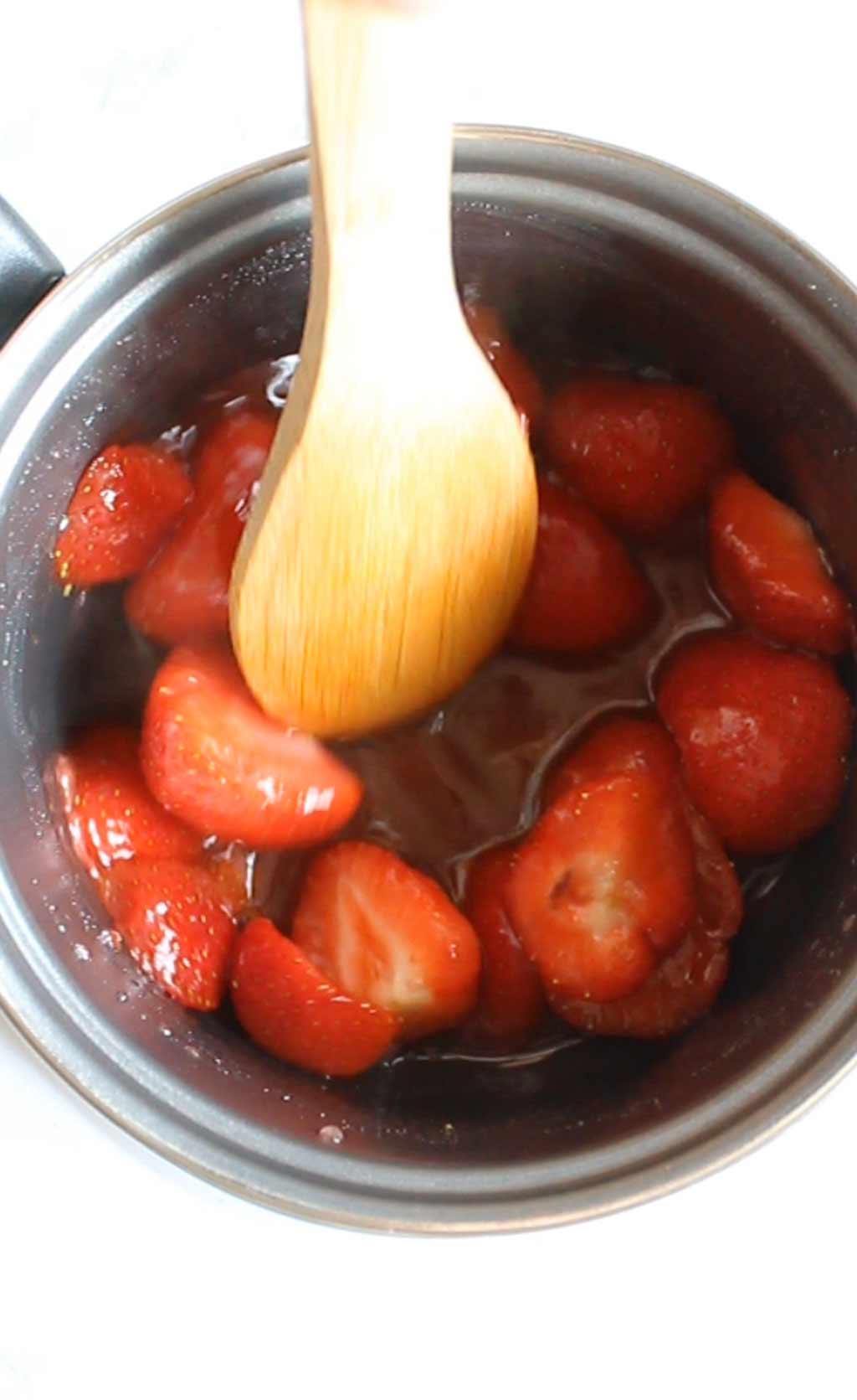strawberries in a pot with sugar