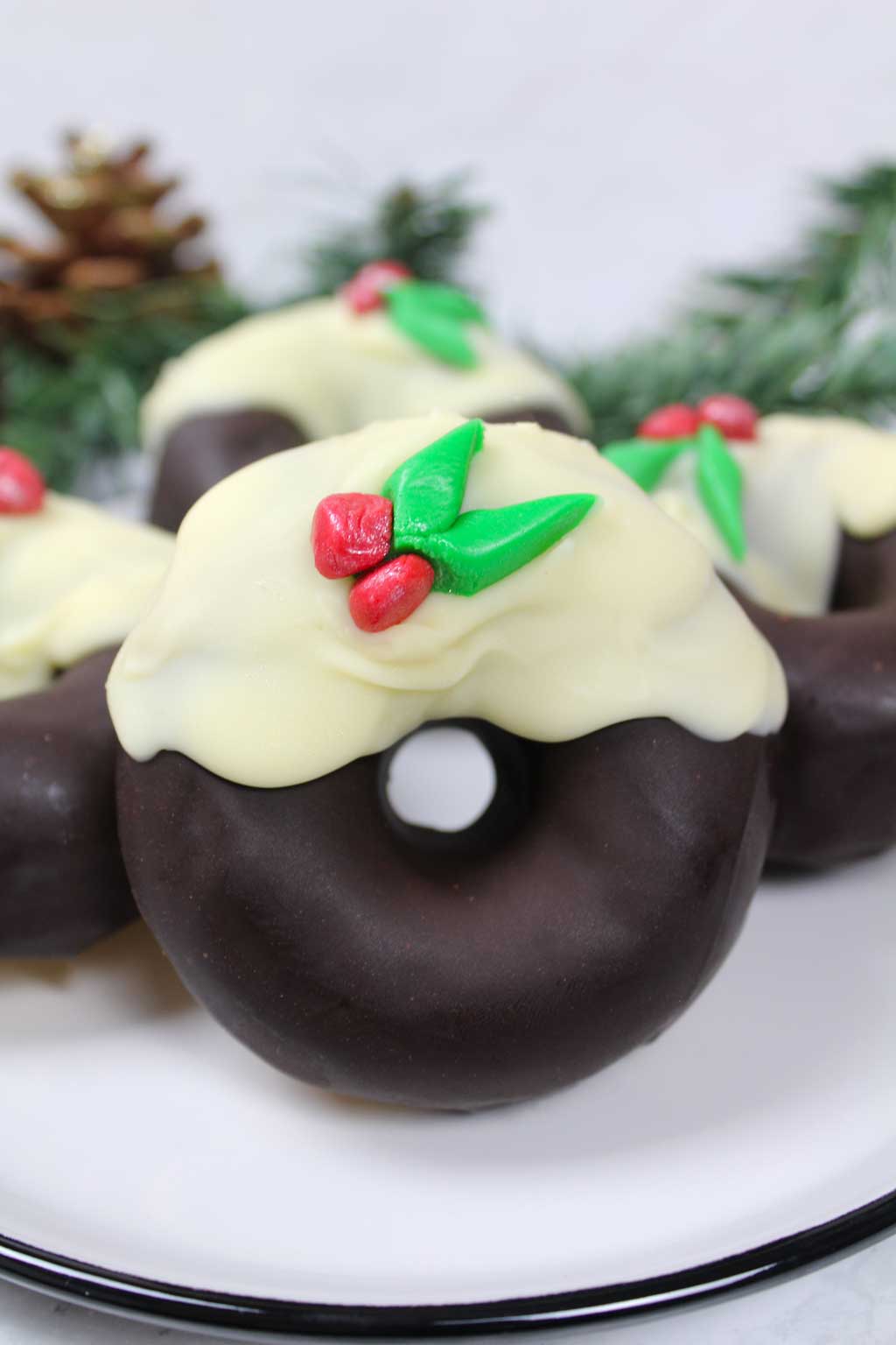 Vegan Christmas pudding donuts on a plate