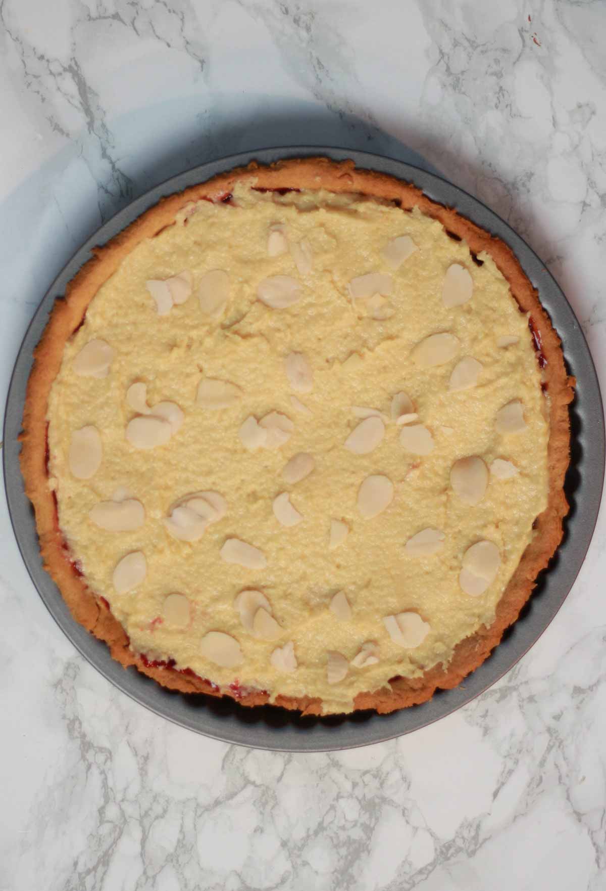 Tart With Filling And Flaked Almonds On Top