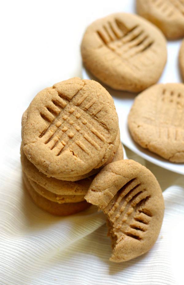stack of sugar free peanut butter cookies with criss cross shapes in the middle