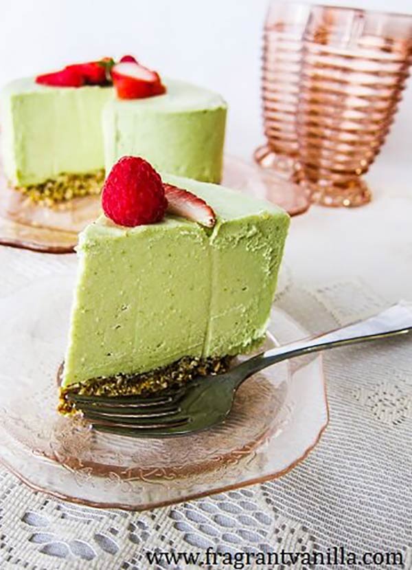 a slice of key lime cheesecake on a plate