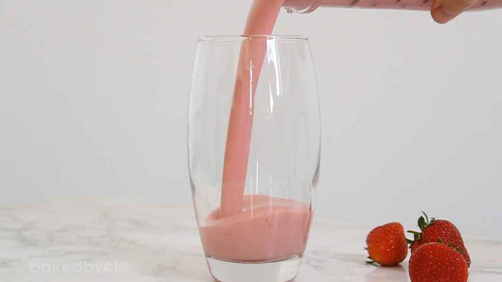 Pouring The Milkshake into a glass