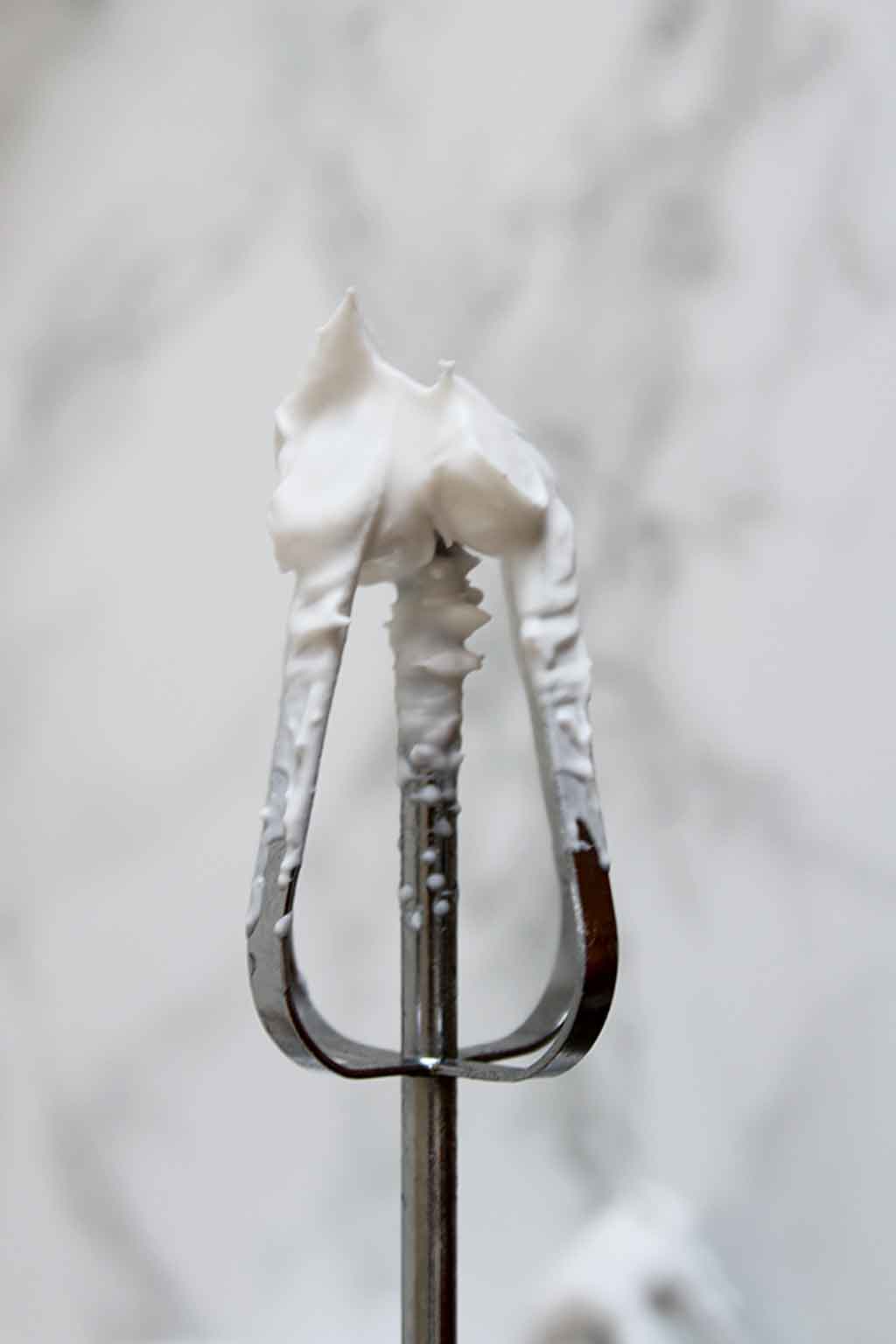 Whipped Coconut Cream On End Of Whisk