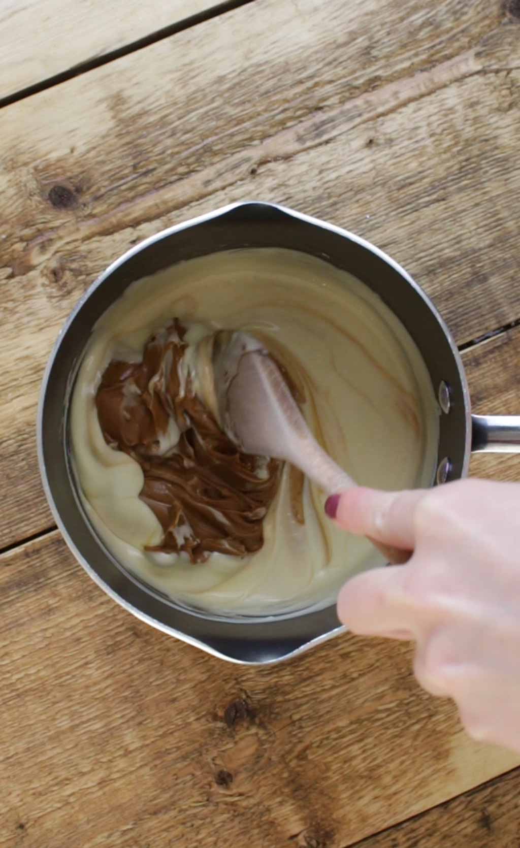 Mixing biscoff Spread Into Melted White Chocolate