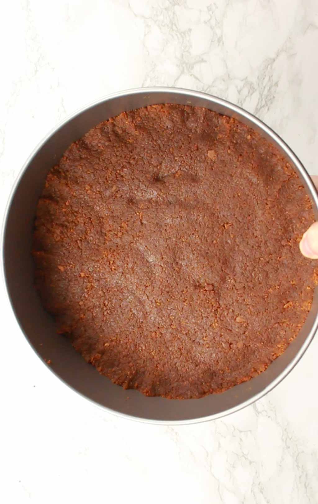 Cheesecake Base Flattened Into Tin