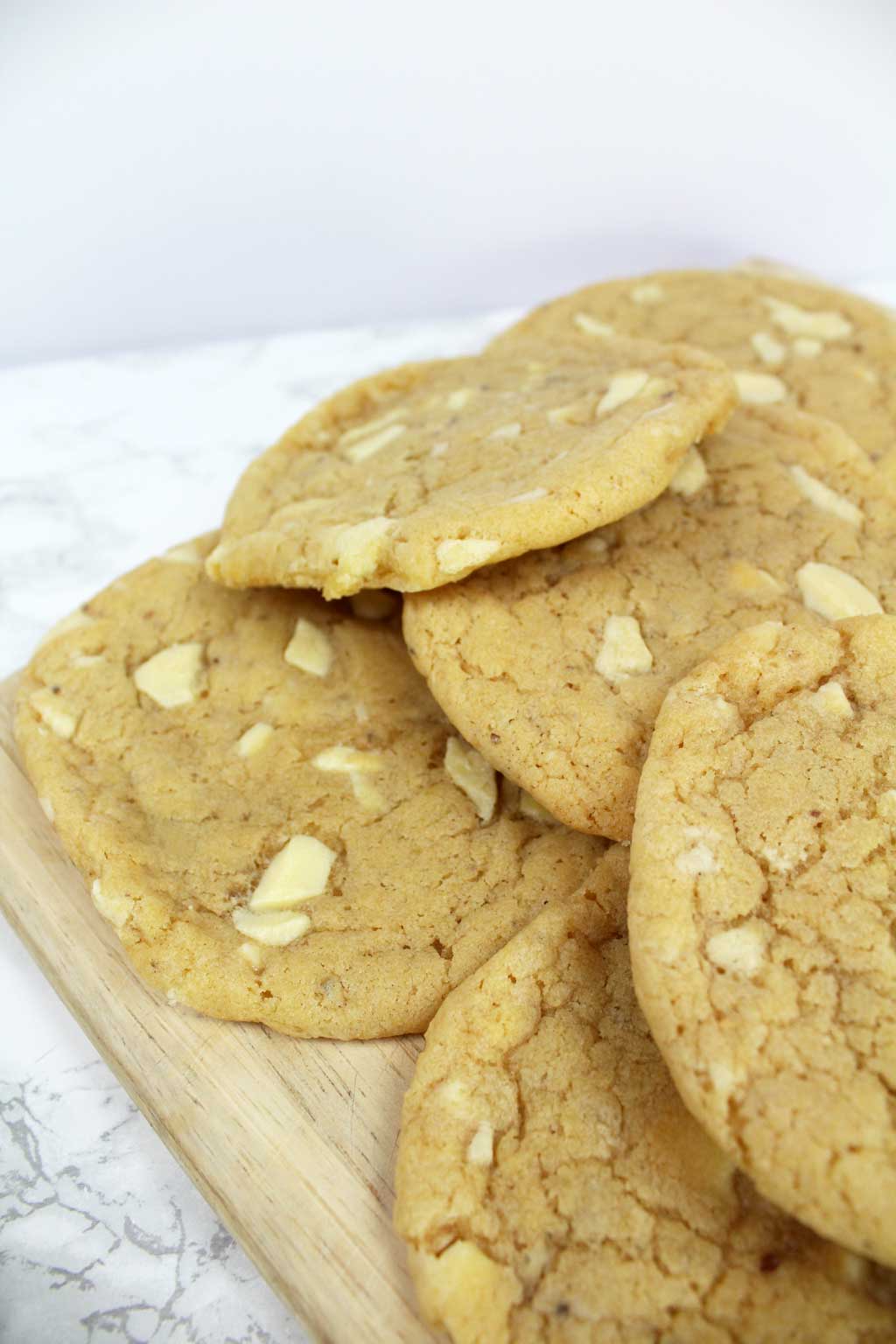 Vegan White Chocolate Cookies in a pile