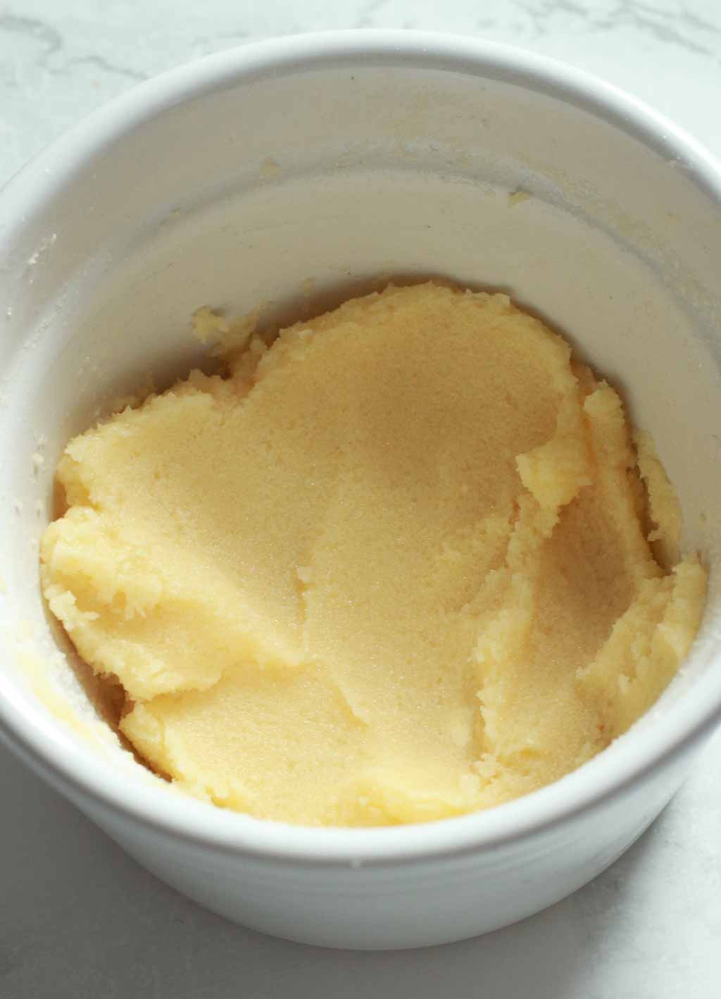 Margarine And Sugar Creamed Together In A White Ramekin