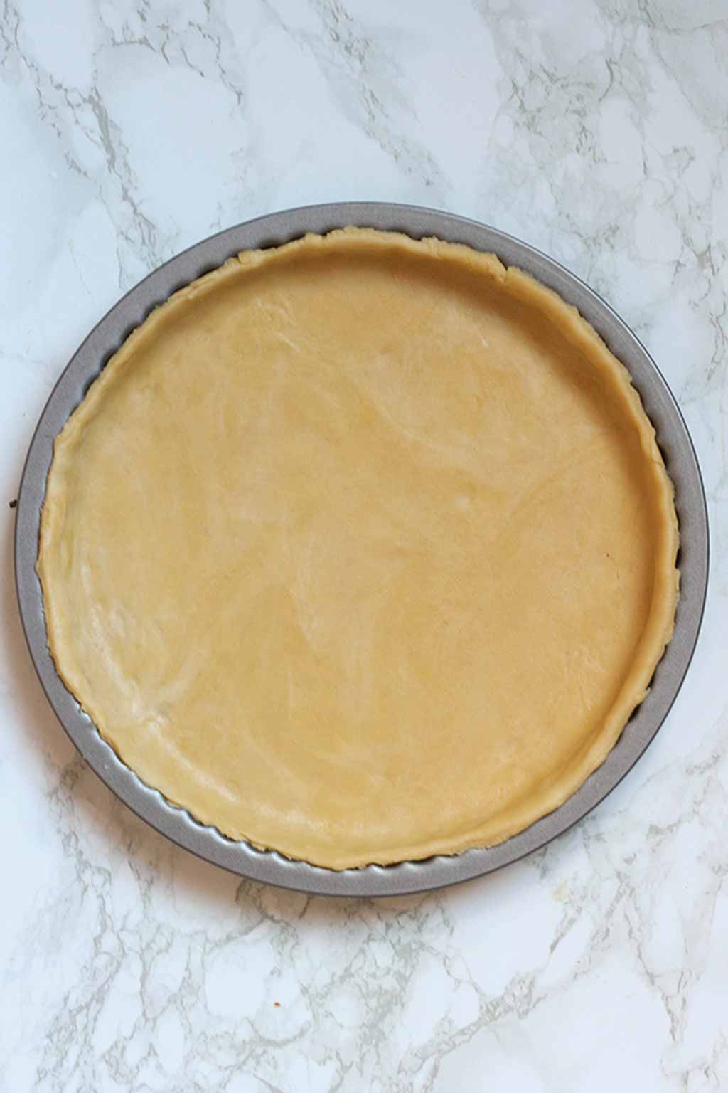Pastry Dough In A Fluted Tin