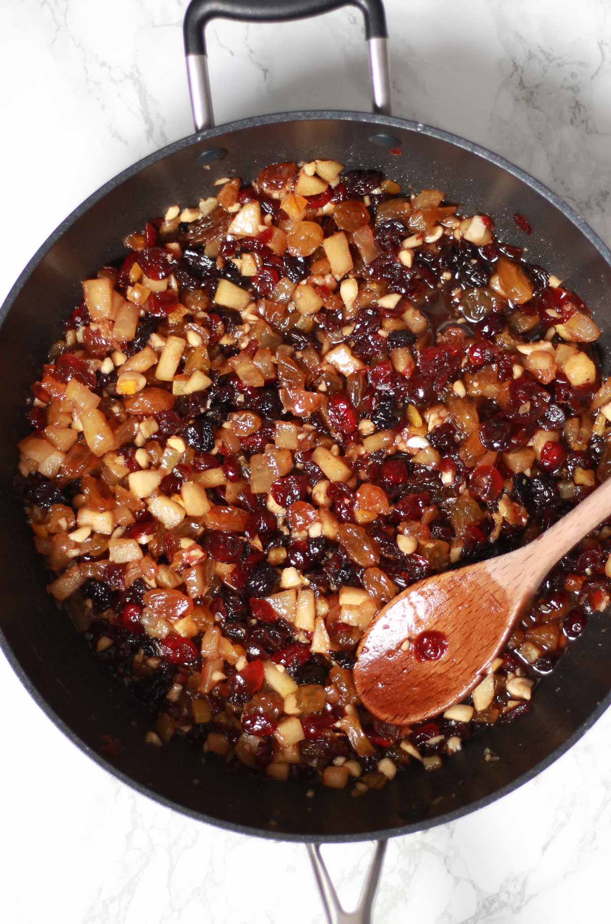 Cooked fruit and nuts In A Pan