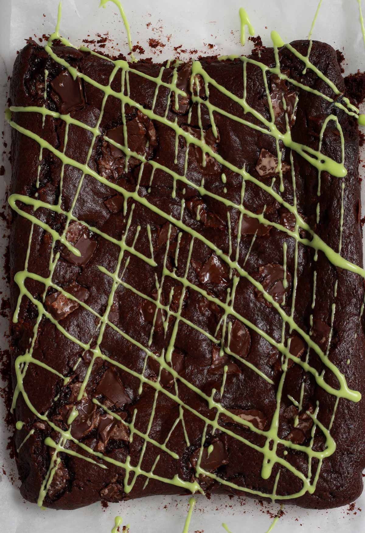 Green Icing Drizzled All Over The Chilled Brownies