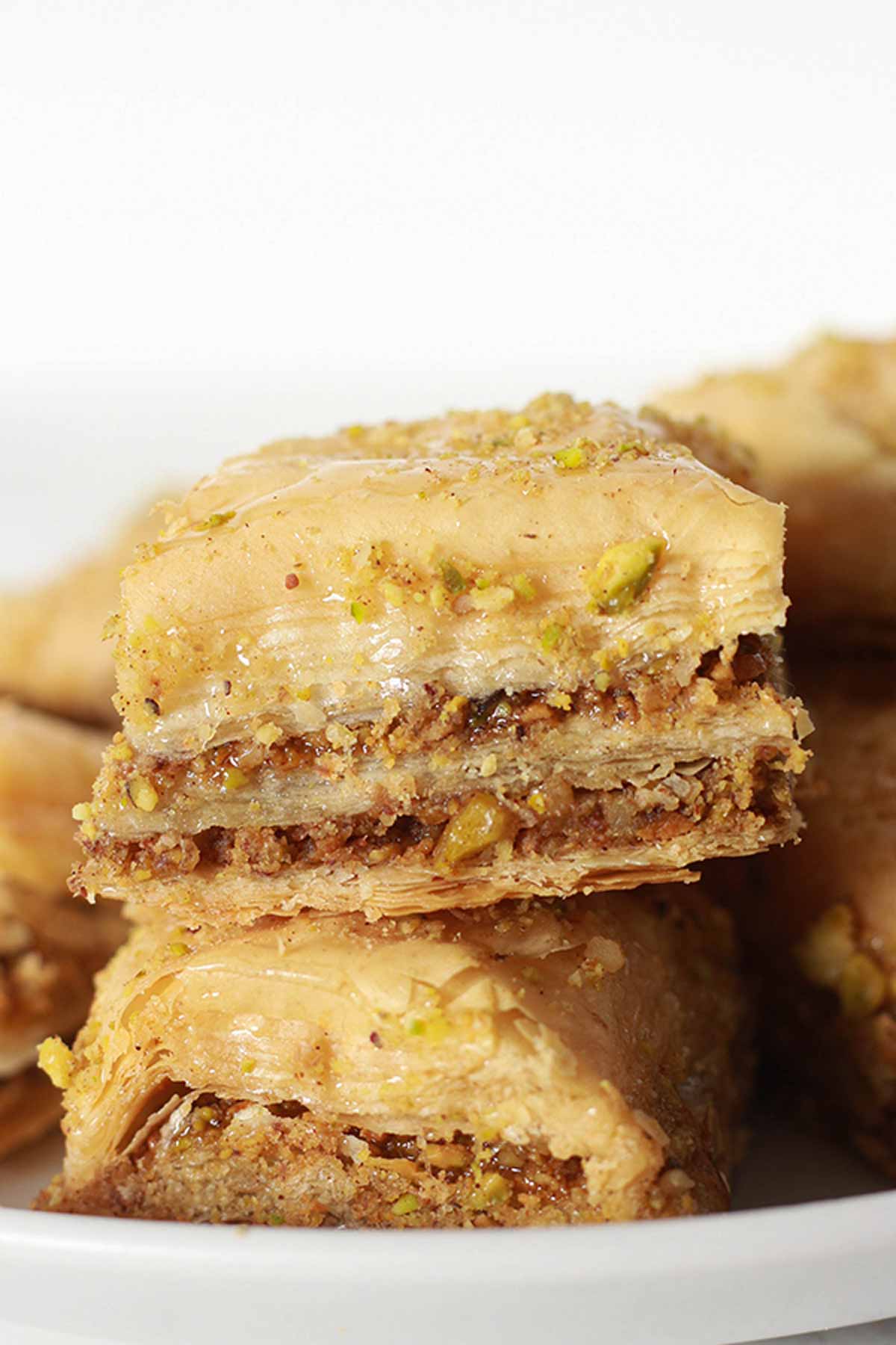 Stacked Slices Of Baklava On A White Plate