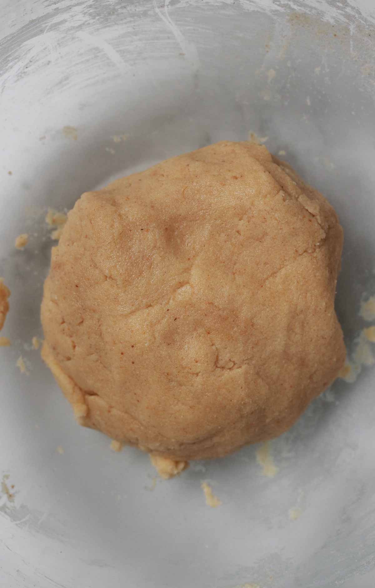 Ball Of Eggless Gingernut Biscuit Dough In A Bowl