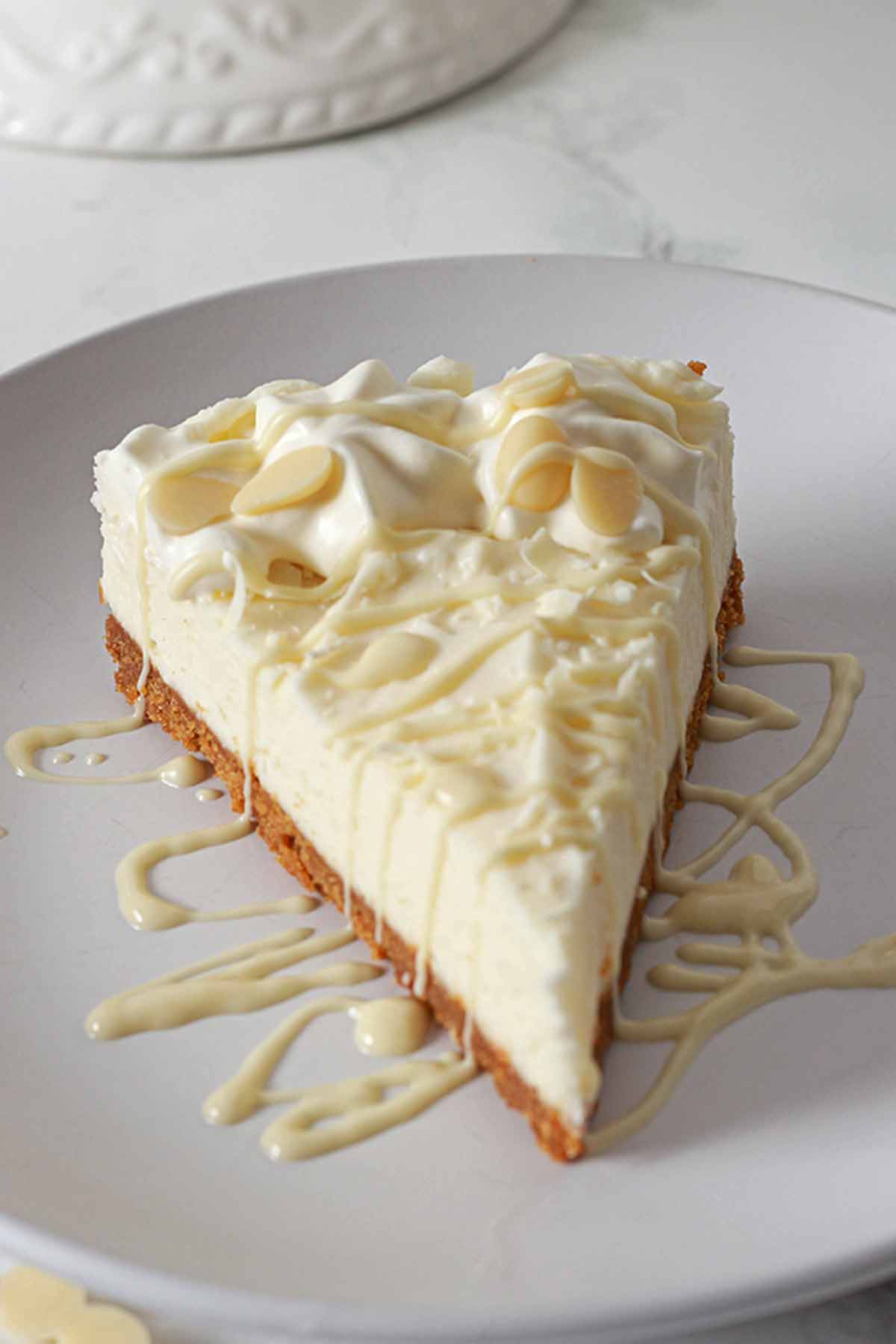 Cheesecake Slice On White Plate