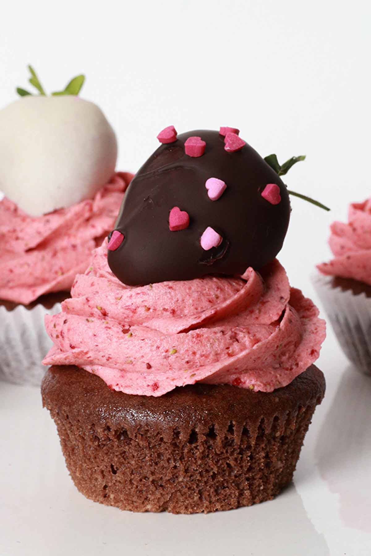 Chocolate Strawberry On Top Of Frosted Cupcake