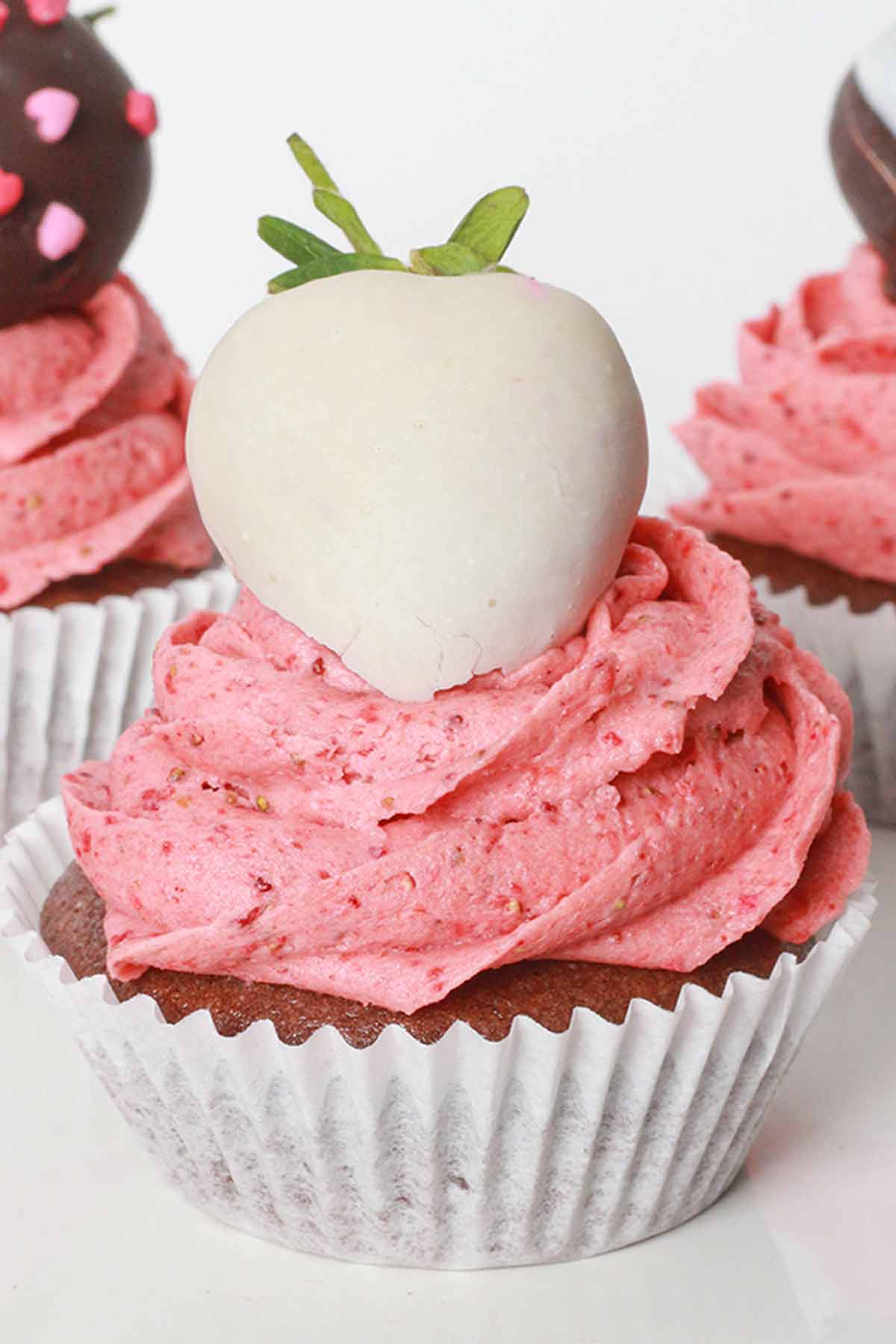 Swirl Of Strawberry Frosting Piped Onto A Cupcake