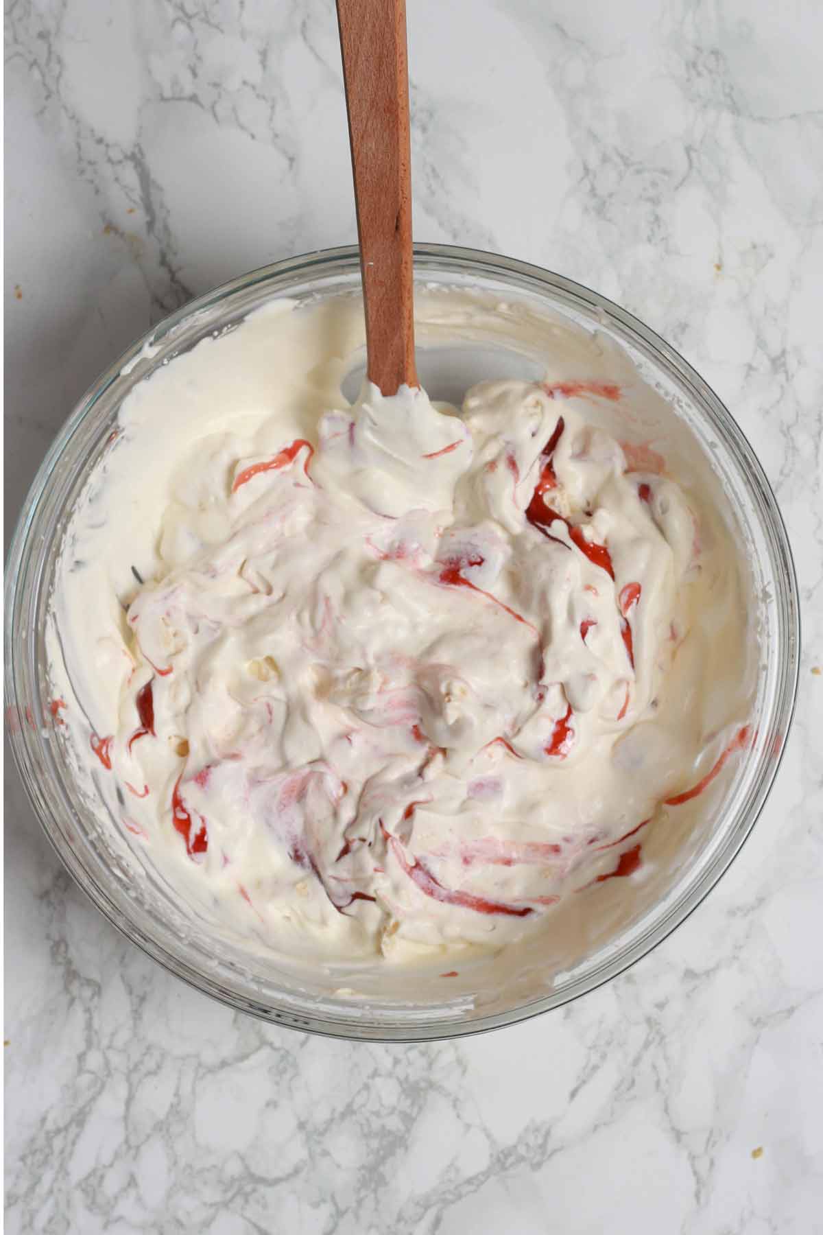 dairy free whipped cream with rest of eton mess ingredients Mixed Together In A Bowl