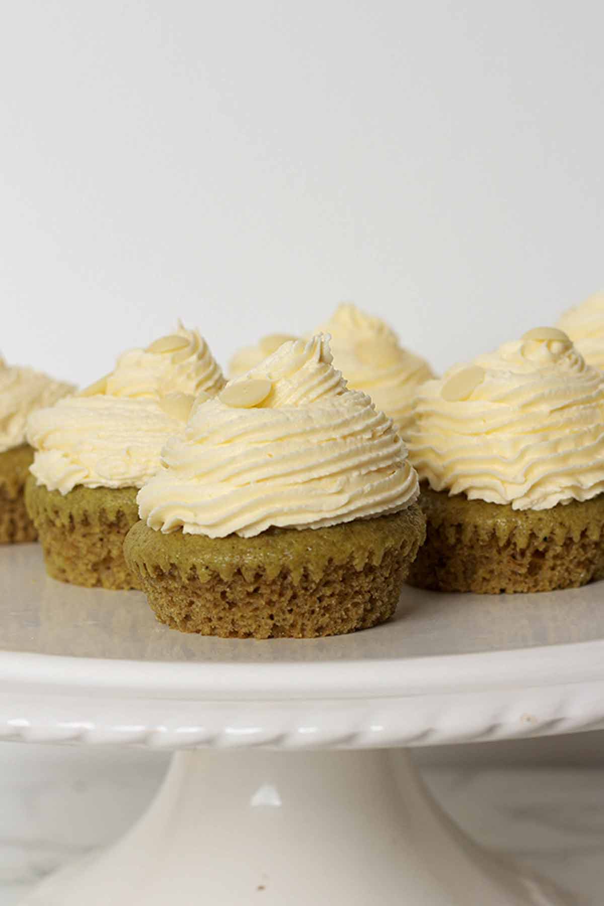 White Chocolate Buttercream Piped Onto Matcha Cupcakes