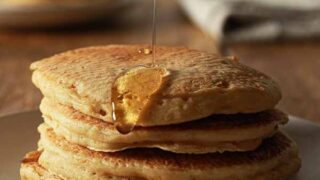 Thumbnail image of a stack of pancakes with syrup dripping down them