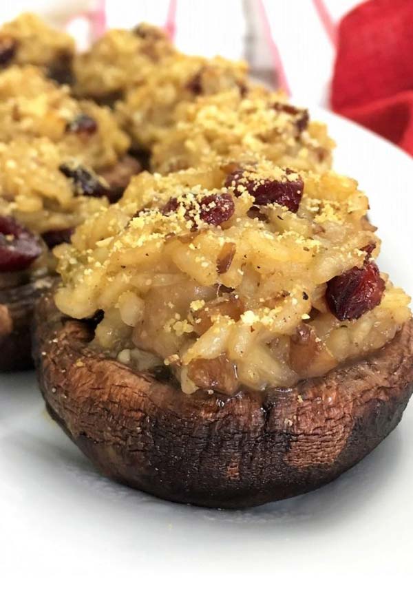 Close up of stuffed mushroom with cheese on top