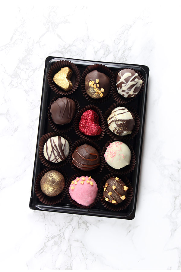 chocolate truffles in a black box