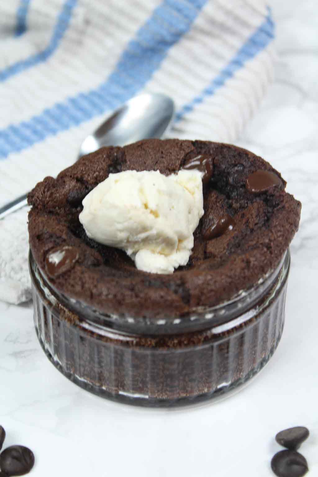 brownie in ramekin with ice cream on top