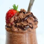 close up of chocolate mousse in a glass container