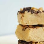 3 pieces of 3 ingredient peanut butter fudge stacked on top of one another