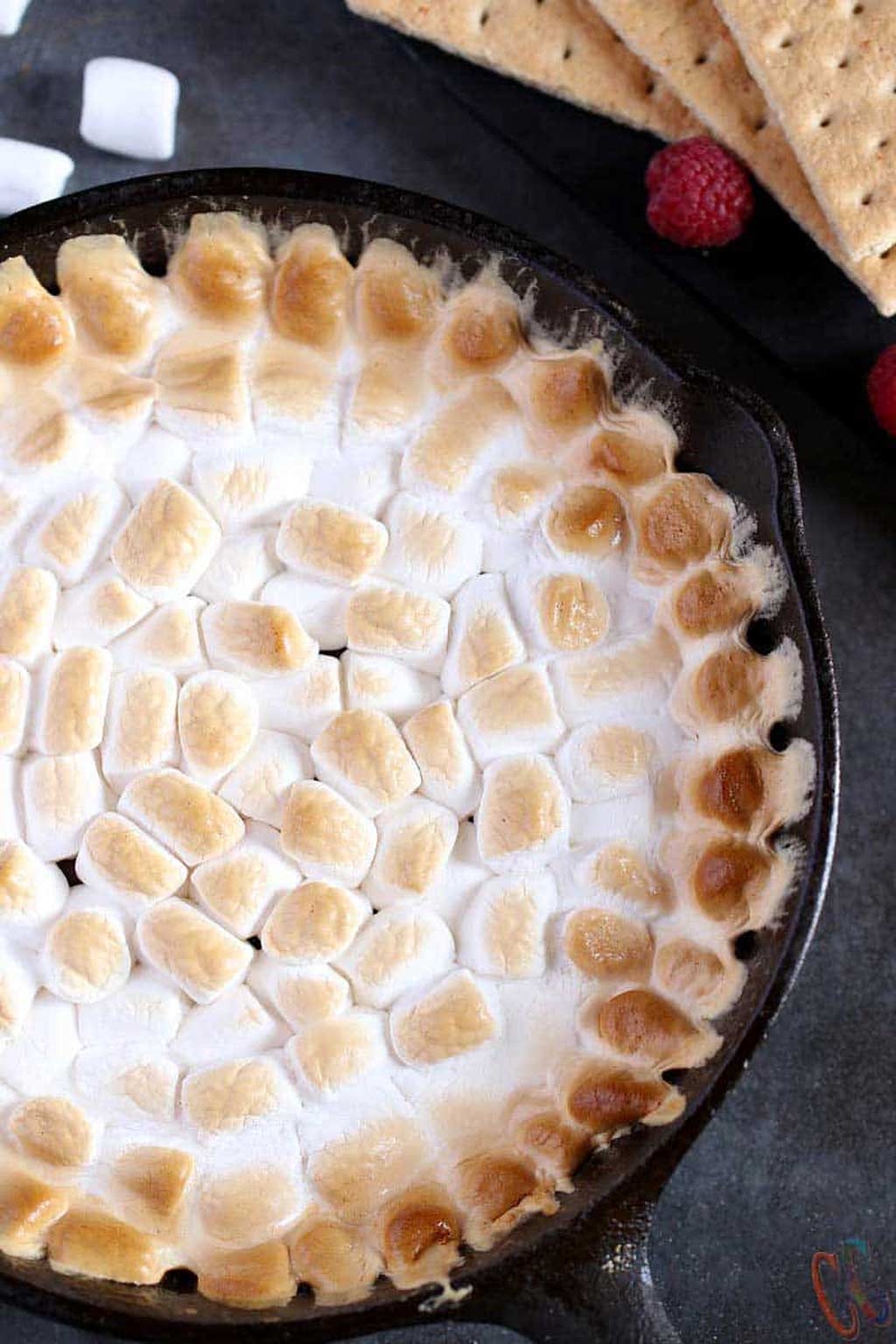 smores dip in a cast iron dish, close up