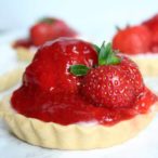 mini strawberry tart with a strawberry on top