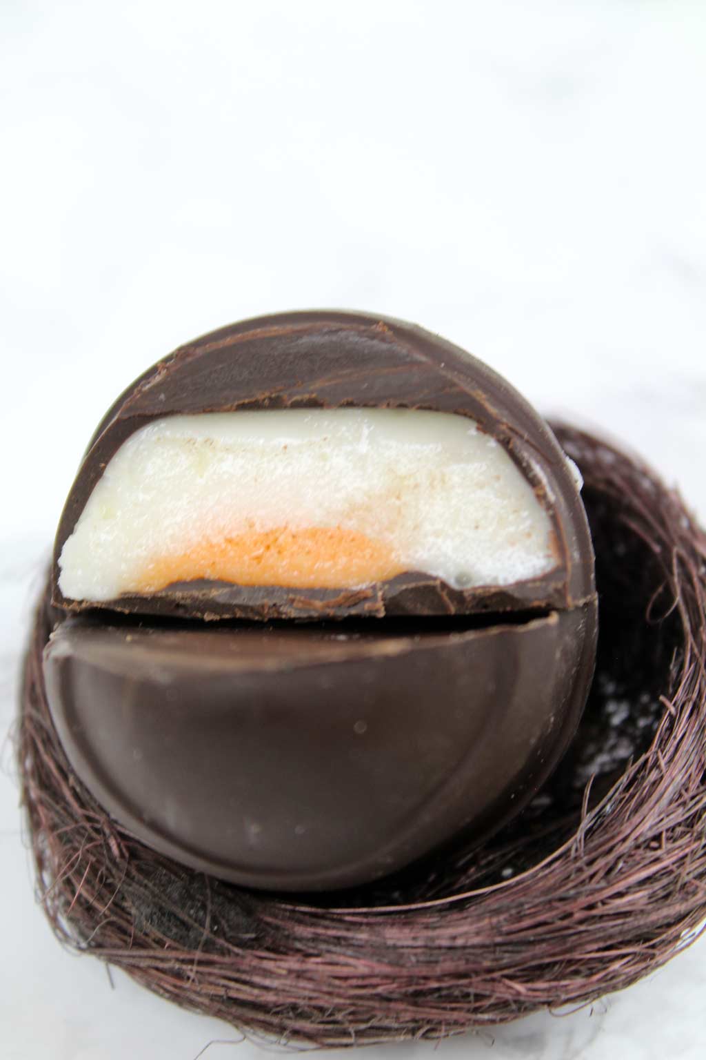 vegan creme egg in a small basket