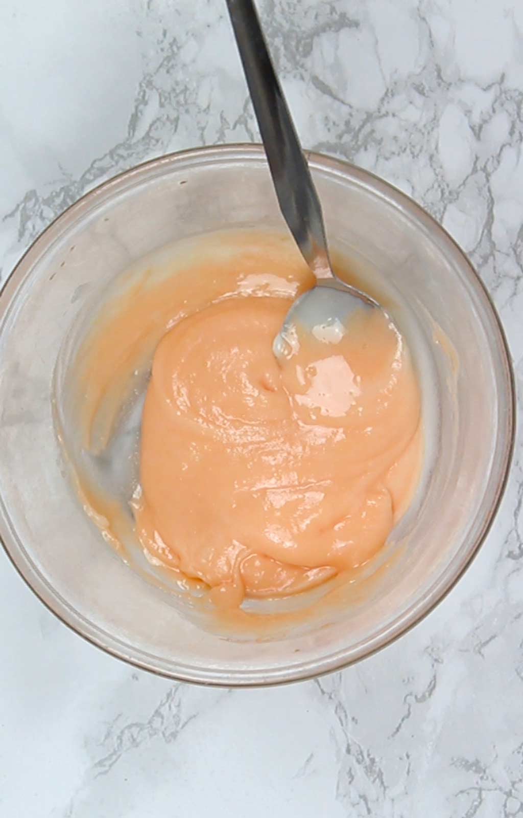 orange fondant in a small bowl