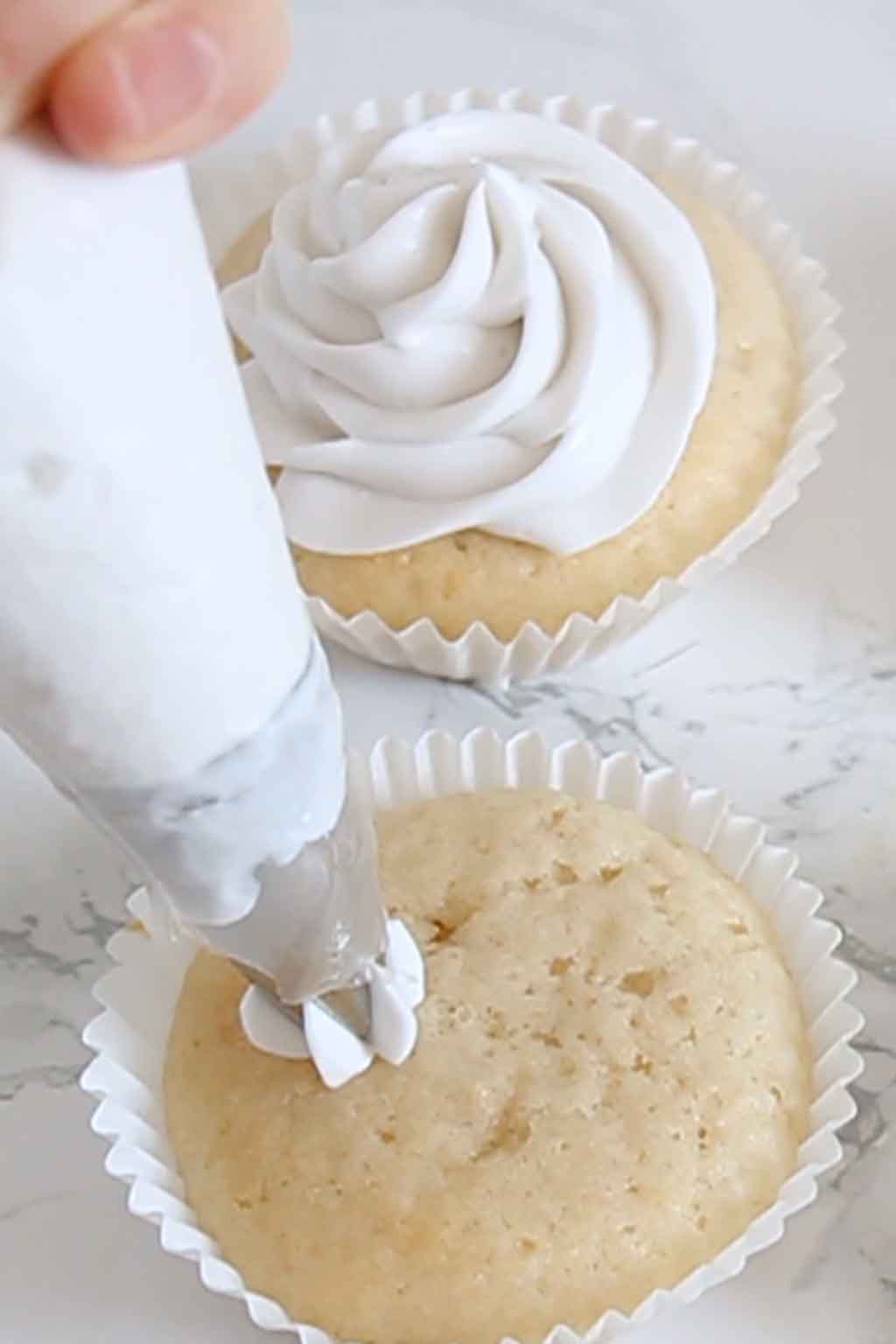 Piping Cream On Cupcake