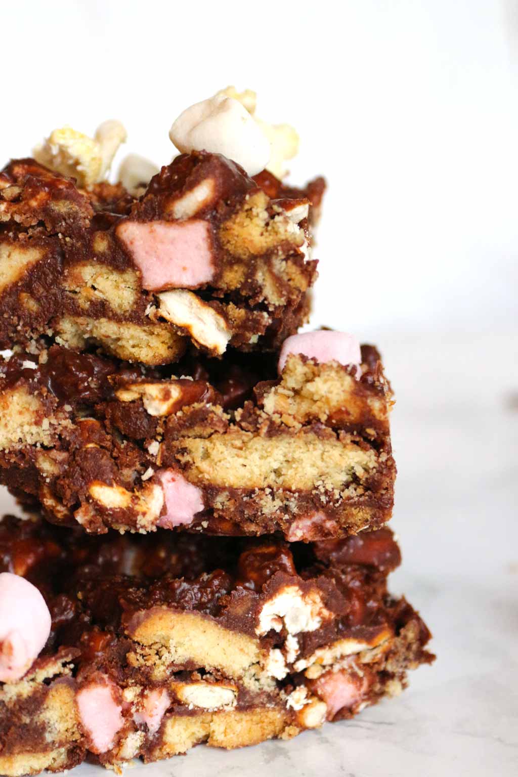 3 slices of Vegan Rocky Road stacked on top of one another
