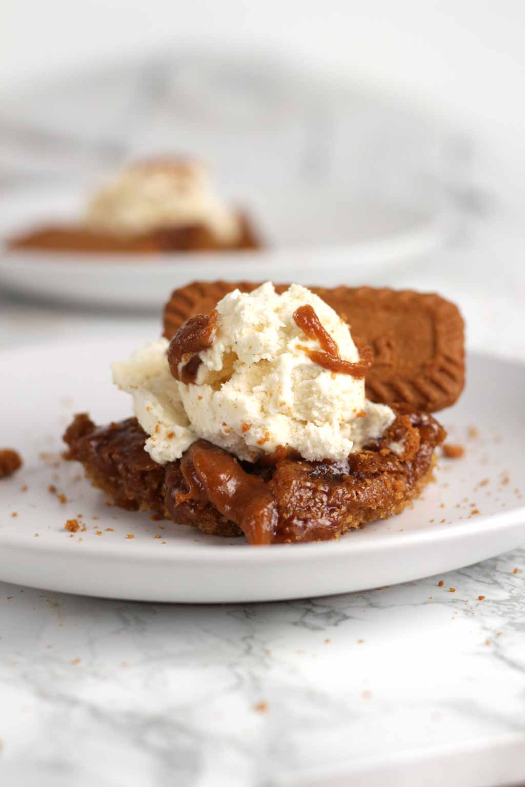 Slice Of Sticky Biscoff Cake With Ice Cream On Top