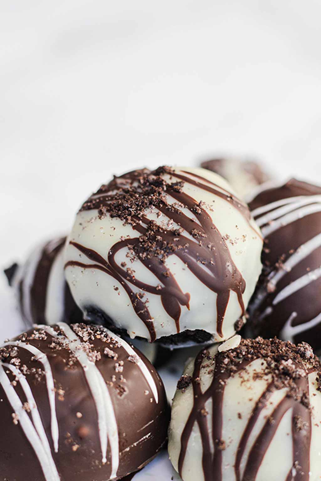 White Chocolate Covered Truffle On A Pile Of Truffles