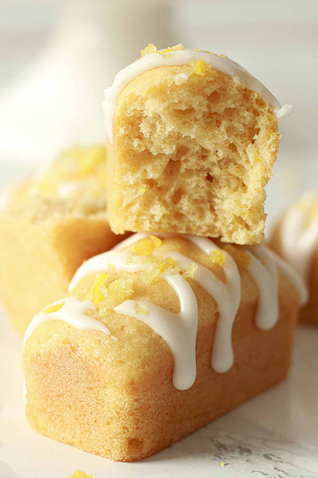 One Mini Lemon Loaf Cake With Another Half Of One On Top