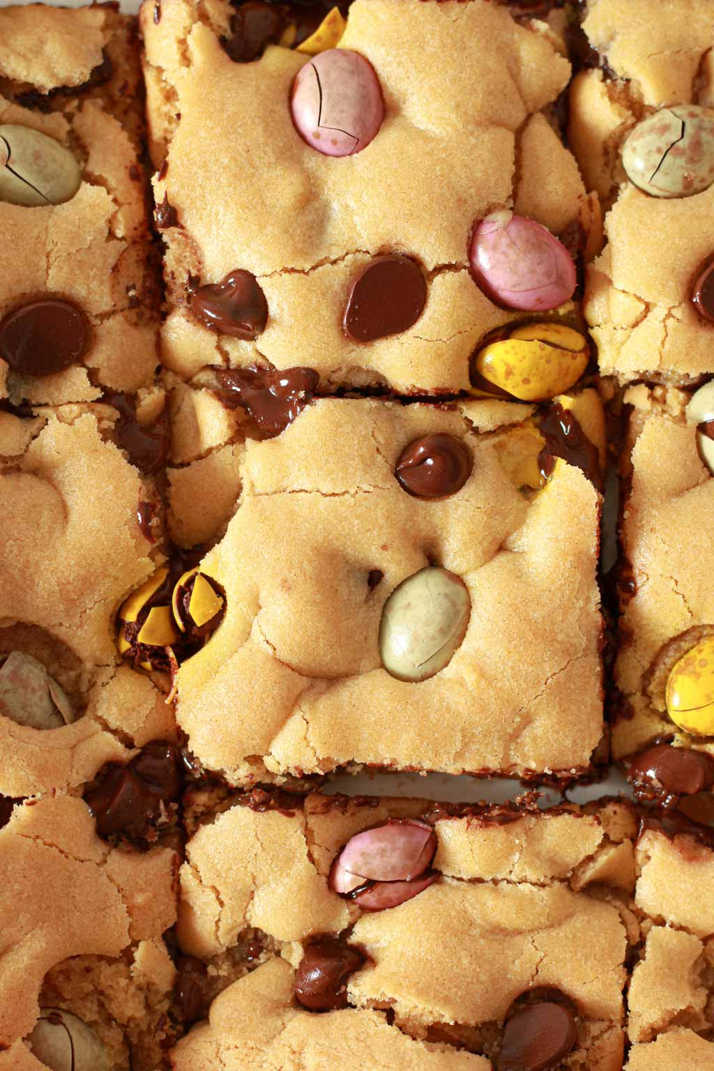 Overhead Shot Of Cookie Squares With Mini Eggs And Chocolate Chips In Them