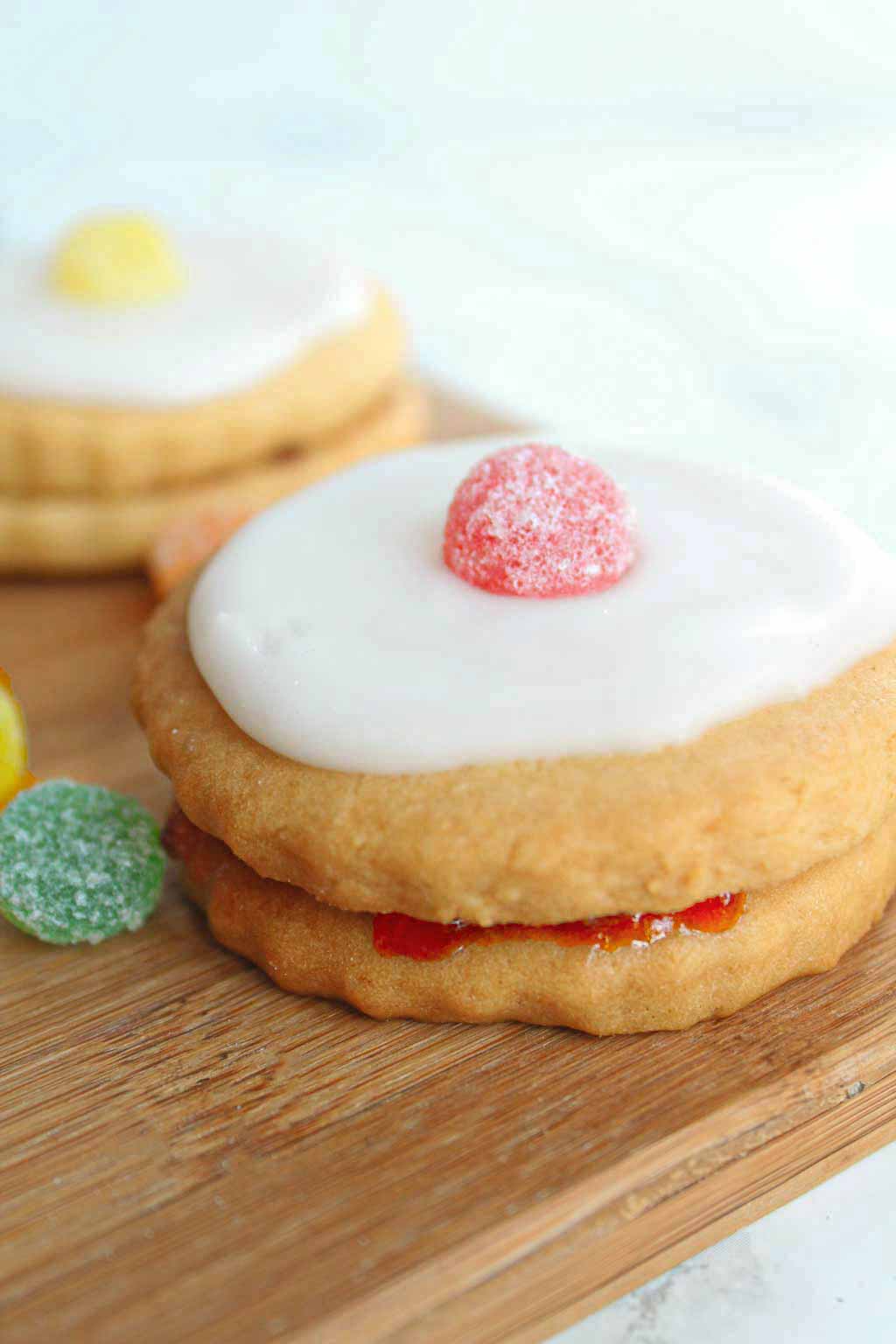 vegan empire biscuit on a wooden board for vegan cookie recipes post