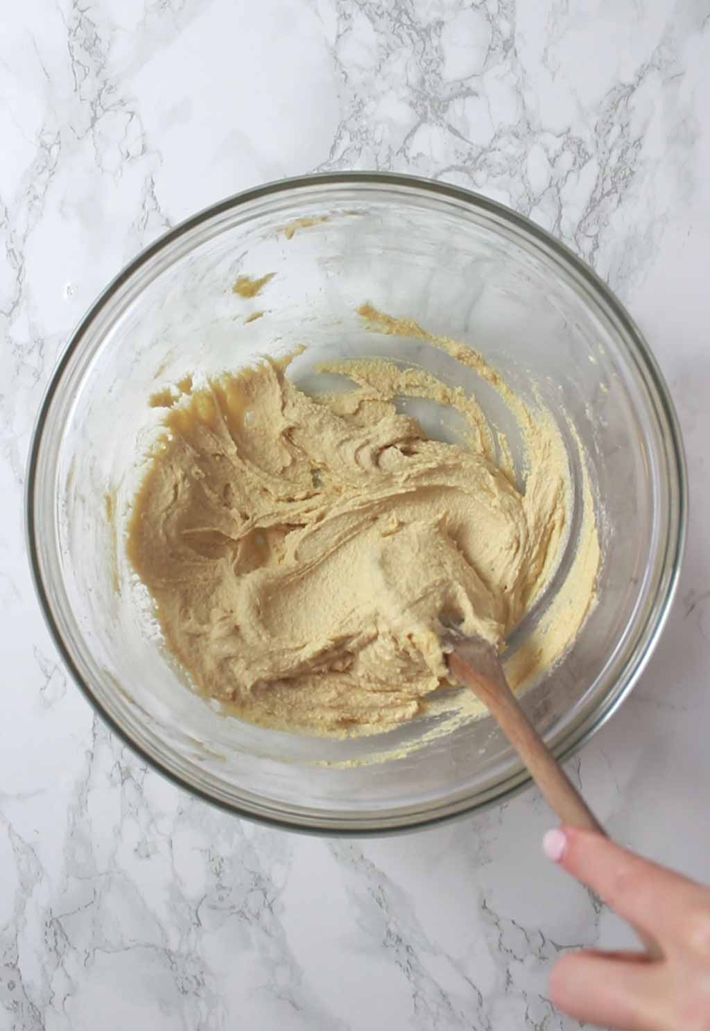 Margrine And Sugar Mixed Together In A Bowl