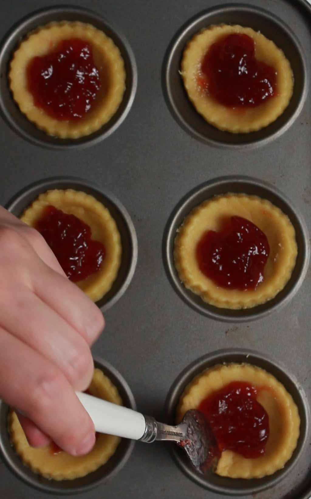 Putting Jam Into The Tarts