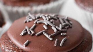 thumbnail image of chocolate fairy cake with sprinkles on top