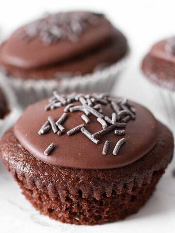 thumbnail image of chocolate fairy cake with sprinkles on top
