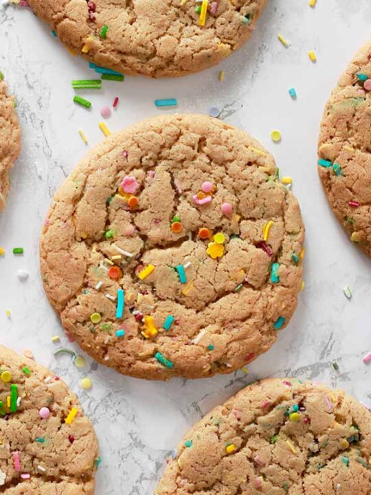 Thumbnail image of vegan funfetti cookies laying on a white background