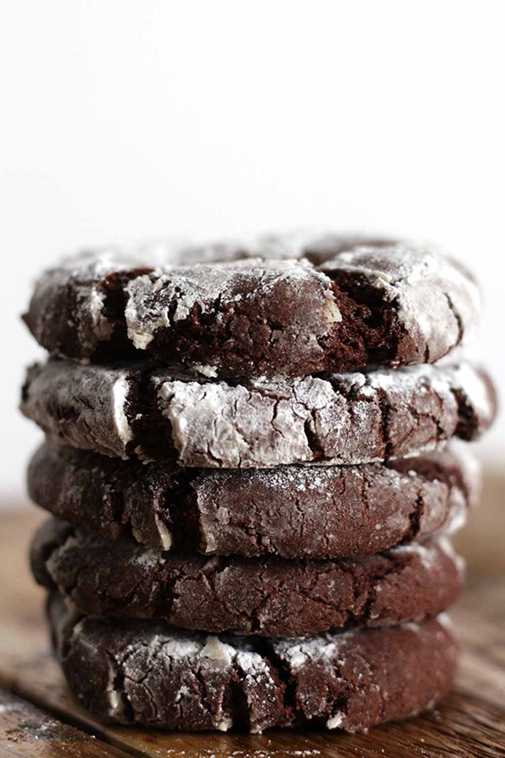a stack of Vegan Chocolate Crinkle Cookies 