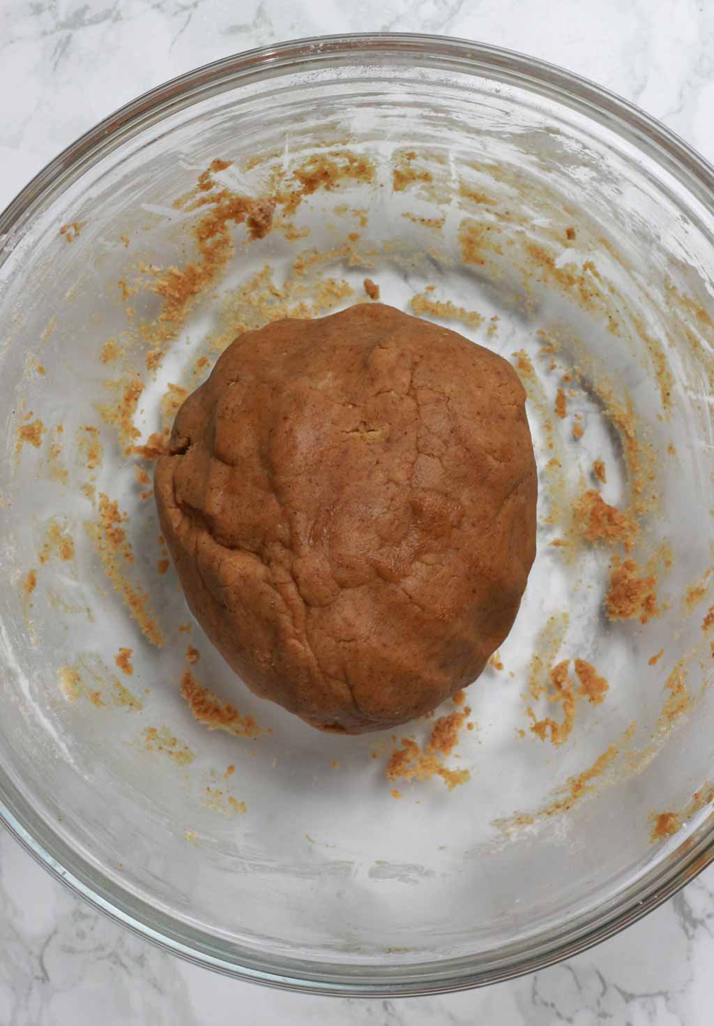 Ball Of Cookie Dough In A Glass Bowl